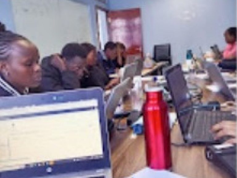 FutureTech Academy trainees practising on live systems