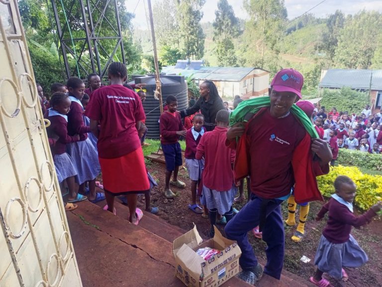 Tangazoletu team sharing gifts with learners at Kambui School for the Hearing Impaired